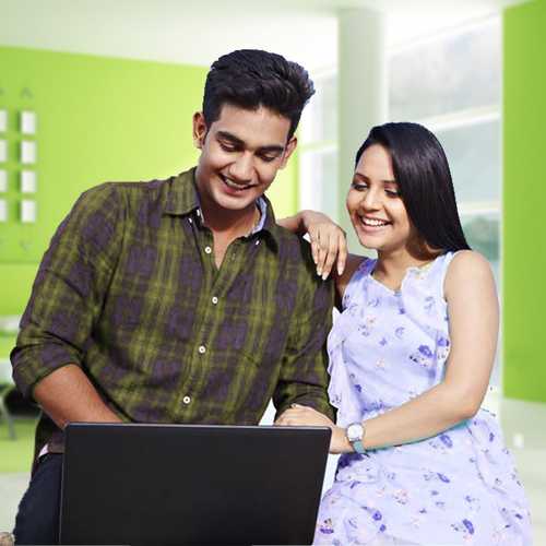 Discussing Finance With Your Partner; Couple looking at an open laptop
