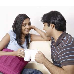 Basic Adjustments and Understanding in Marriage; Couples Discussing with a Cup of Coffee in Hand